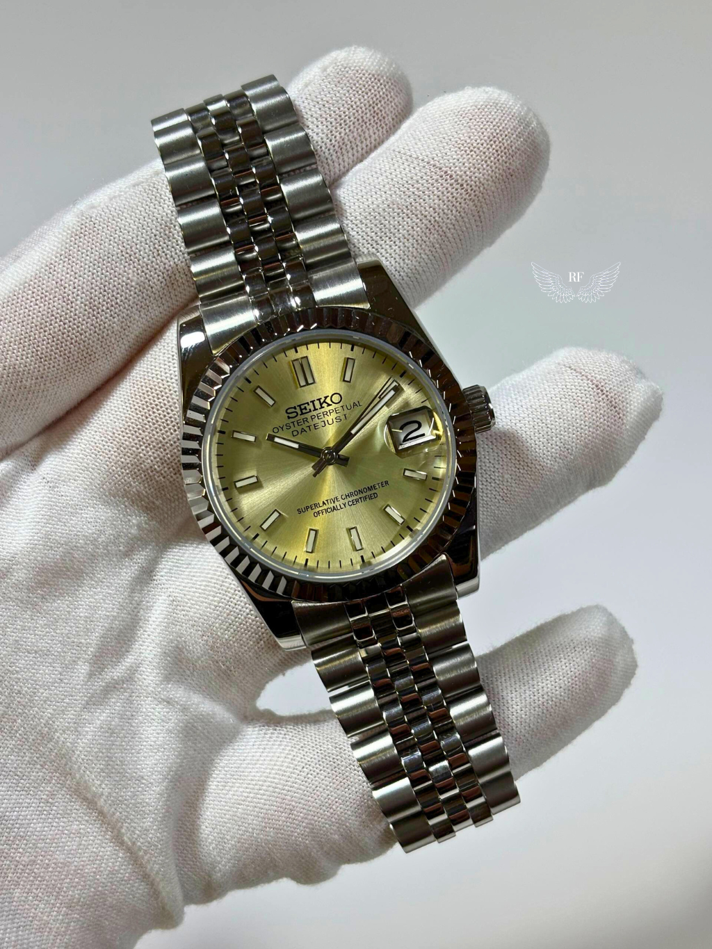 Sunburst Champagne Dial